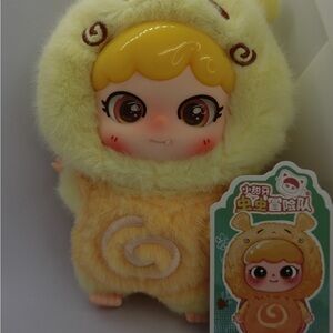 Cute Yellow Plush Doll with Swirl Design